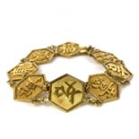 A 14ct gold Chinese Bracelet.