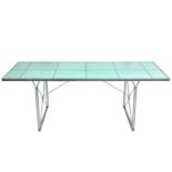 Niels Gammelgaard for Ikea a glass topped Moment dining table.