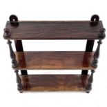 A Victorian rosewood and simulated rosewood wall shelf.