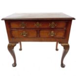 A George III mahogany side table or lowboy.