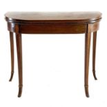A George III mahogany and rosewood banded fold top card table.