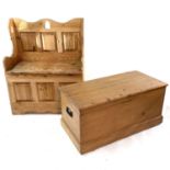 A pine settle and a blanket box.