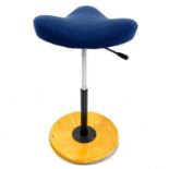A Norwegian Stokke ergonomic balance stool.