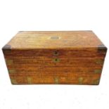 A teak and brass bound sea chest.