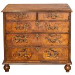 A William and Mary walnut and marquetry chest.