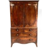 A George III mahogany linen press.