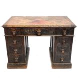 A Victorian oak twin pedestal writing desk.