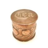A Newlyn copper cylindrical tea caddy and cover.