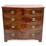 An early Victorian mahogany bow front chest.