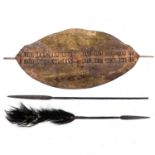 A Zulu hide war shield and two spears.