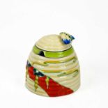 A Clarice Cliff Fantastique beehive honey pot and cover.