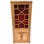 A Victorian pine display cabinet.