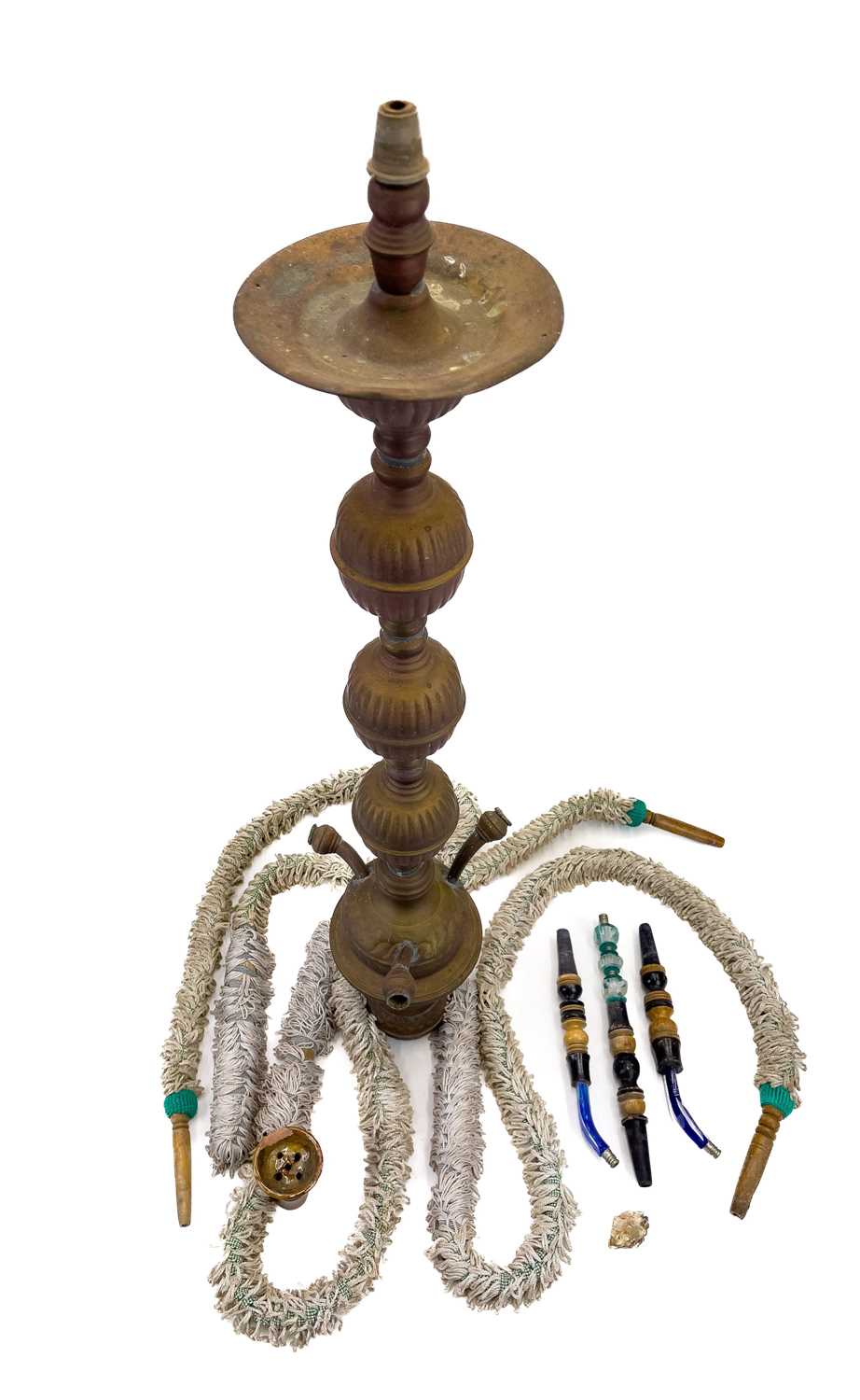 A tall pierced Indian brass hookah.