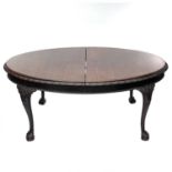 A late Victorian mahogany oval extending dining table.