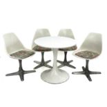 An Arkana white laminate Tulip table and four chairs.