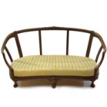 A walnut French settee.