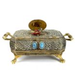 A 20th century German gilt metal bird automaton music box.