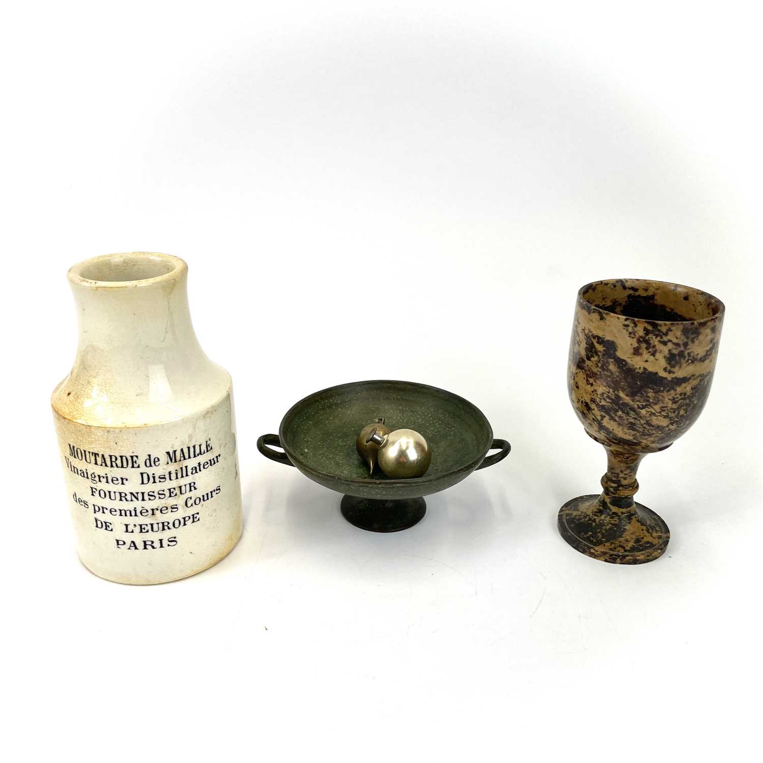 A small bronze tazza with twin handles.