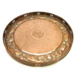 A Newlyn circular copper tray.