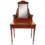 A late Victorian pitch pine dressing table.