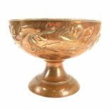 A Newlyn copper rose bowl.