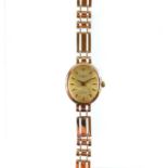 A Rotary Elite modern 9ct gold quartz ladies bracelet wristwatch.
