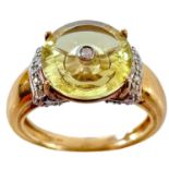 A Glenn Lehrer 9ct gold diamond and citrine set Torusring ring.