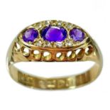 An Edwardian 18ct gold amethyst and diamond ring.