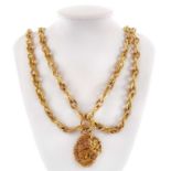 A Chanel gold plated double row long pendant chain necklace.