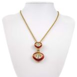 A stylish Christian Dior gilt metal and guilloche enamel pendant necklace.