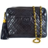 A Chanel black quilted lambskin crossbody shoulder bag, circa 1991-1994.
