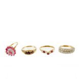 Four 9ct gold stone set rings.