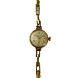 A 1950's Everite 9ct ladies manual wind bracelet wristwatch.