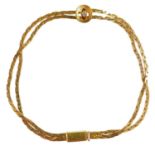 A 9ct gold double strand fancy link bracelet.