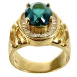 A stylish 18ct gold green tourmaline and diamond set dress ring.