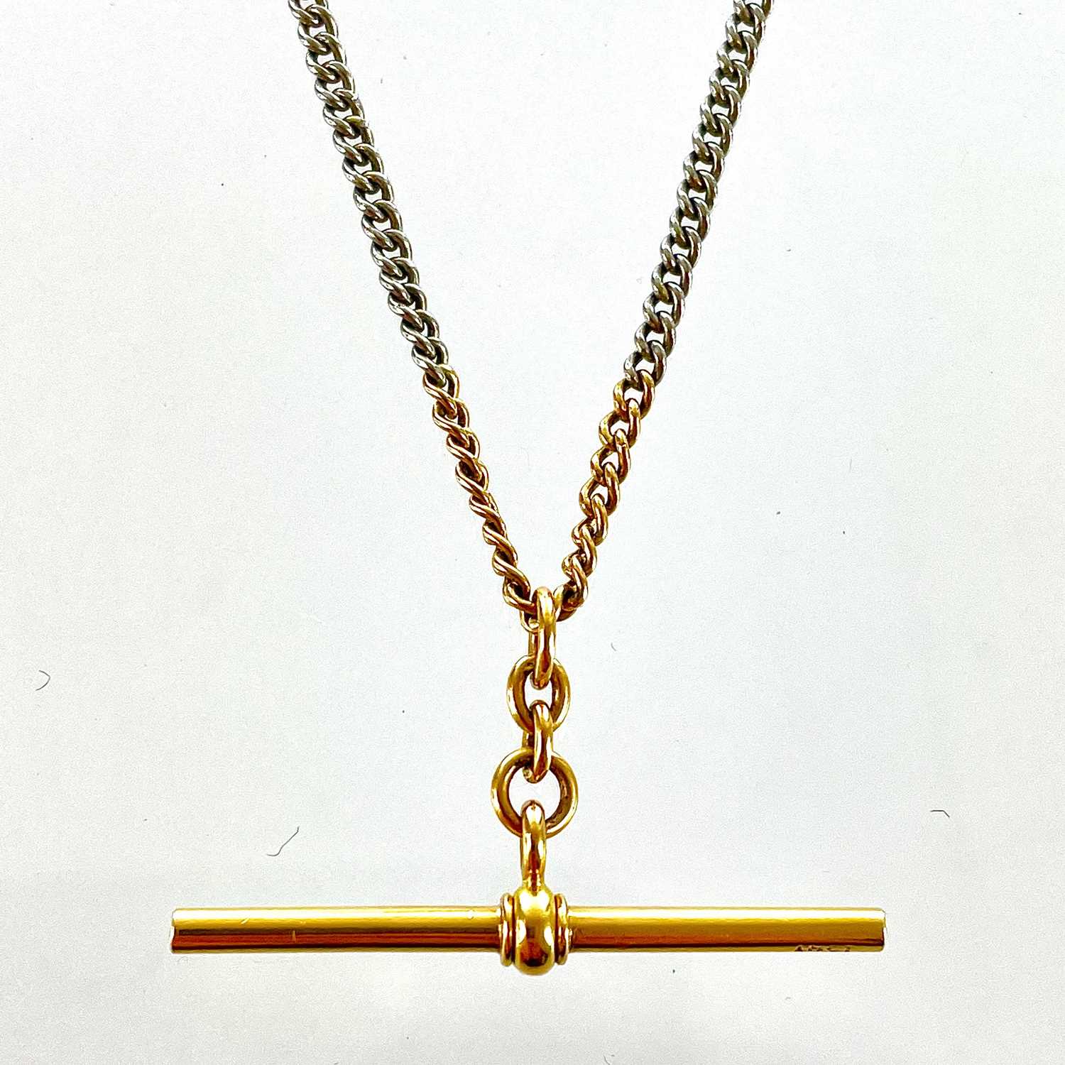 An 18ct bi-colour gold fine curb link Albert pocket watch chain. - Image 2 of 4