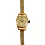 An 18ct gold ladies manual wind bracelet wristwatch.