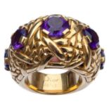 An extravagant Christian Dior 18ct gold amethyst set heavy five stone ring.