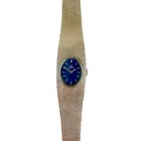 A 1970's Omega 9ct white gold ladies manual wind bracelet wristwatch.