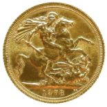 A 1978 full sovereign coin.