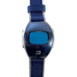 A Pulsar Spoon W671-4100 digital quartz wristwatch.