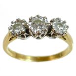 An 18ct diamond set three stone ring.