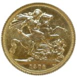 A 1978 full sovereign coin.