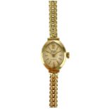 A 1960's 9ct gold ladies manual wind bracelet wristwatch.