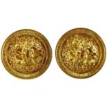 A Chanel pair of gold plated disc CC clip earrings.