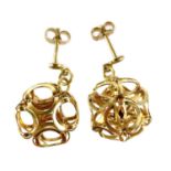 A pair of modern 9ct gold spherical openwork pendant stud earrings.