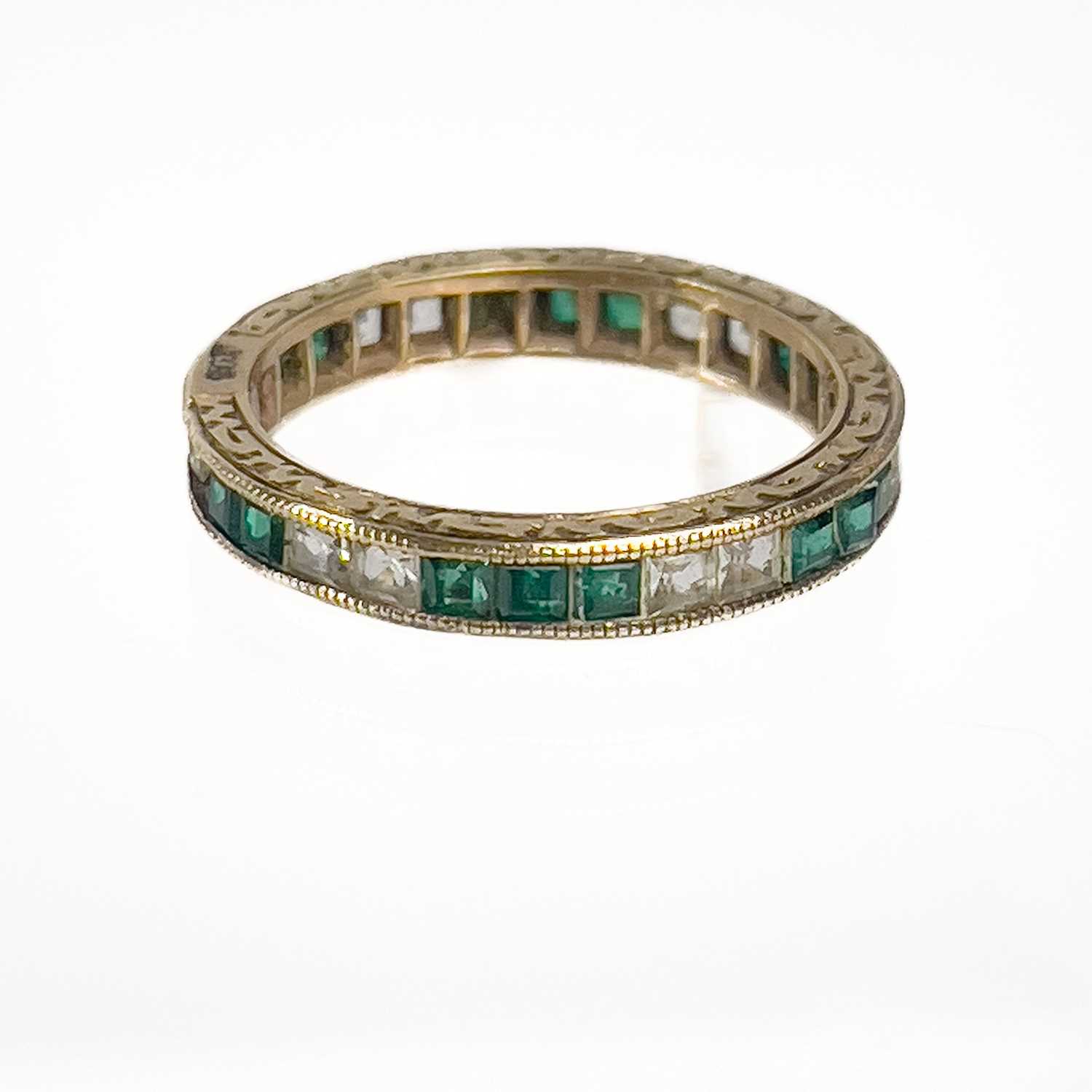 A 9ct gold white and green stone set full eternity ring. - Bild 2 aus 6