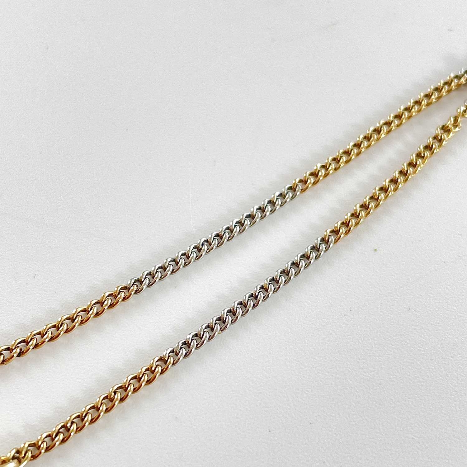 An 18ct bi-colour gold fine curb link Albert pocket watch chain. - Image 3 of 4