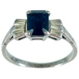 An 18ct white gold diamond and sapphire set ring.