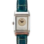A Jaeger LeCoultre Reverso Duetto diamond set stainless steel manual wind ladies wristwatch.
